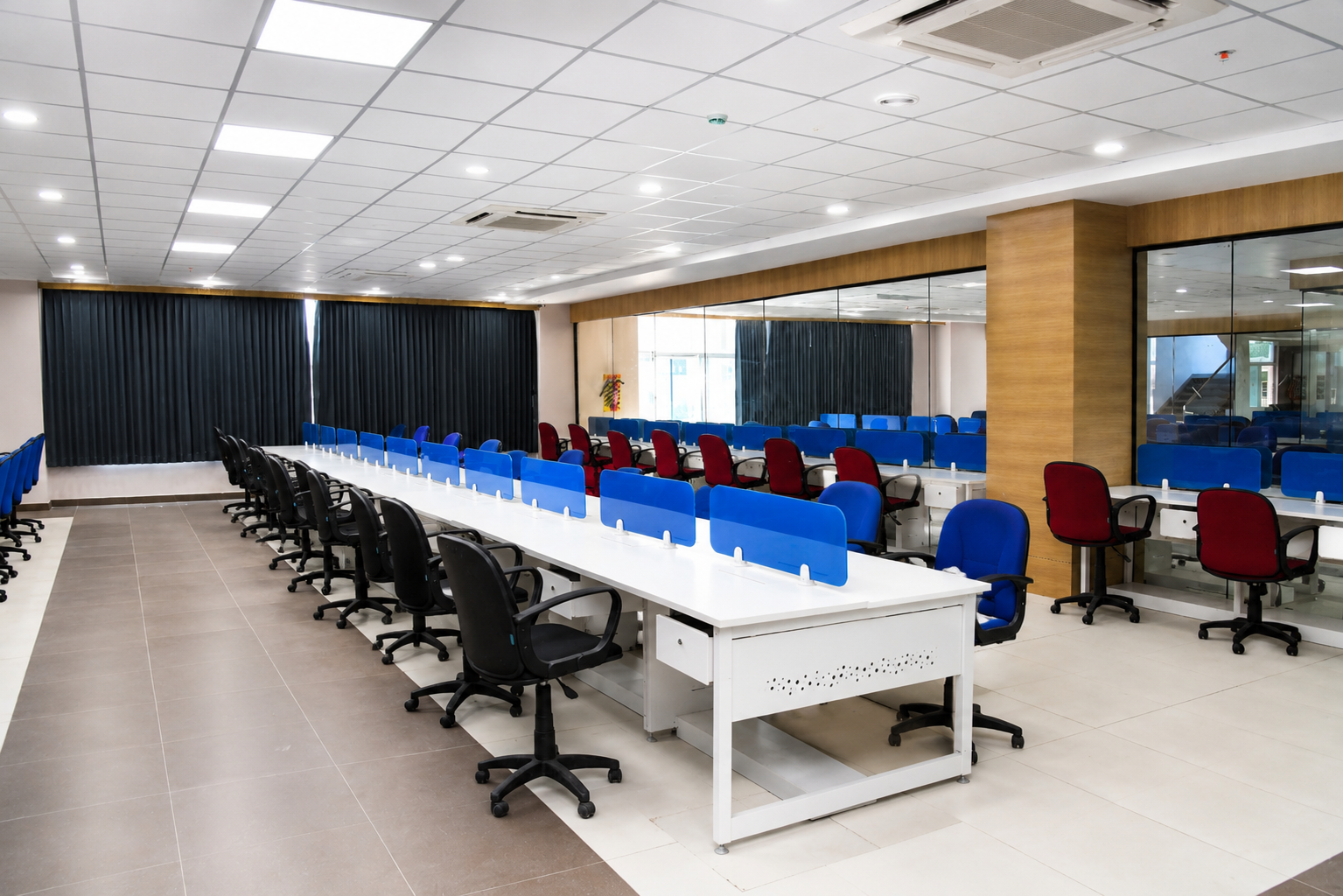 Office layout with red and blue chairs at ZenoVus Park